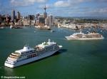ID 1689 SILVER WHISPER (2001/28258grt/IMO 9192179) of Silversea Cruises, in foreground, and Hapag-Lloyd's EUROPA (1999/28437grt/IMO 9183855) in Auckland, New Zealand for the opening day's racing in the 2003...
